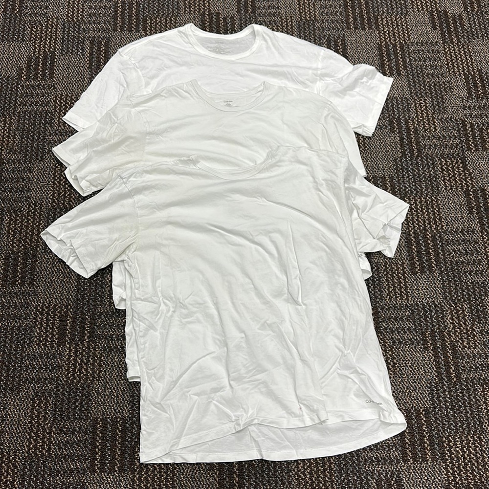 Three Calvin Klein White Tees